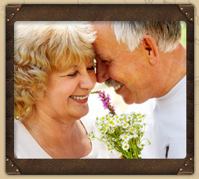 older couple with flowers